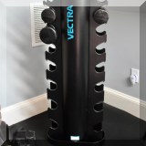 X04. Vectra dumbbell stand and weights. 
